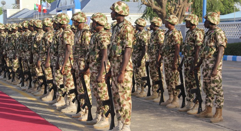 Troops from operation Hadin Kai Maimalari line up at the Aiir Force Base in Maiduguri on December 11, 2023 during Nigerian President Bola Tinubu visit to the start of the Chief of Army Staff's (COAS) Annual Conference 2023. [Getty Images]